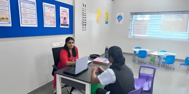 Teacher guiding student in a personalised classroom setting Teacher guiding student in a personalised classroom setting