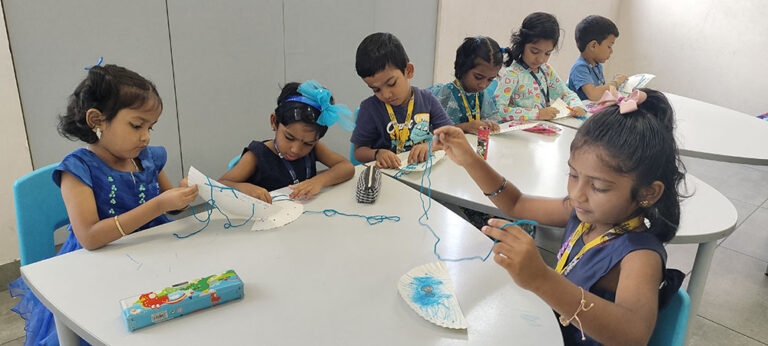 Children exploring creative activities at Shraddha Children’s Academy